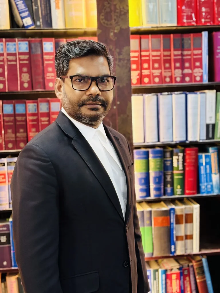Barrister Kazi Akhtar Hosain, Head of Chambers, in the chambers library